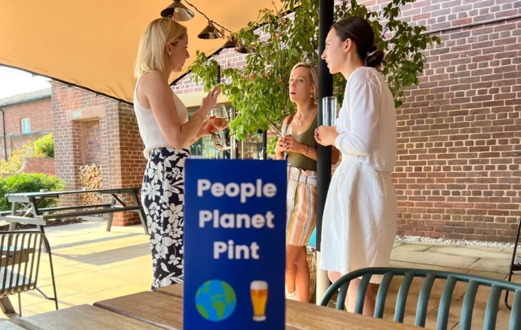 Group of people at a "People, Planet, Pint" meet-up