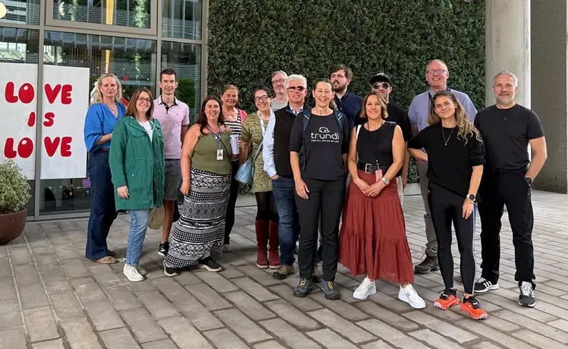 A group of people outside Alderley Park