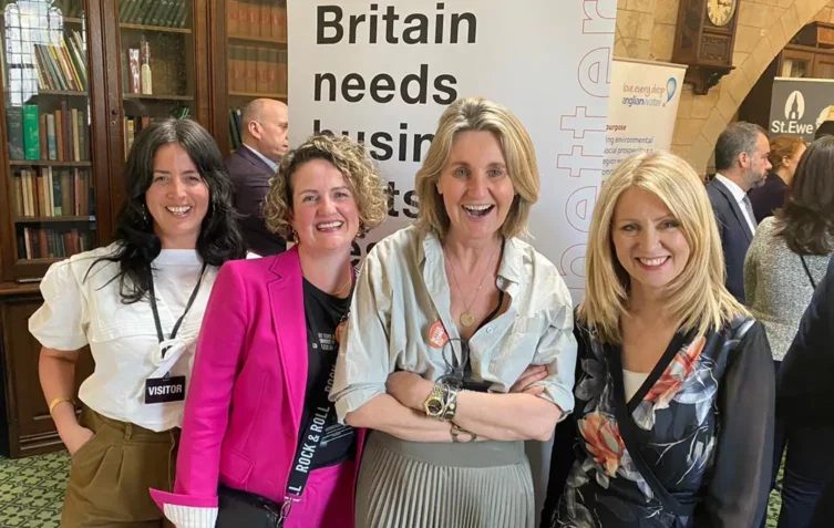 Three AG team members at an event with Mary Portas