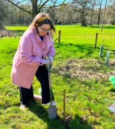 Woman planting a tree