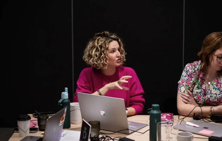 Lynne in a meeting